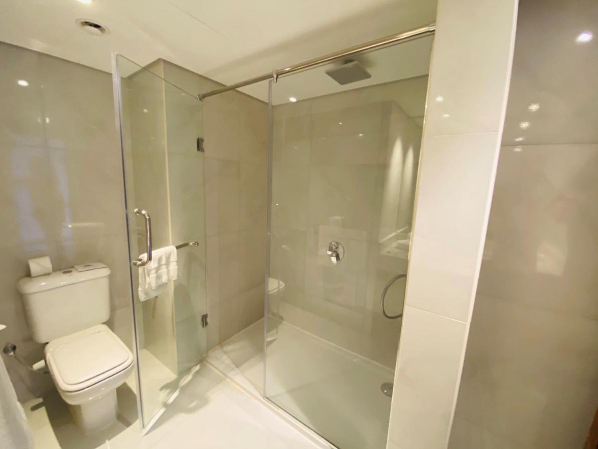 Hurghada Suites & Apartments Serviced By Marriott Exterior photo A shower cubicle